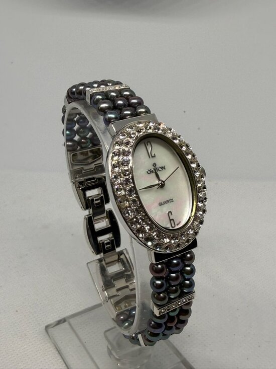 Croton Women Silver Oval Crystal Pavé Bezel MOP Dial Black Pearl Bracelet Watch